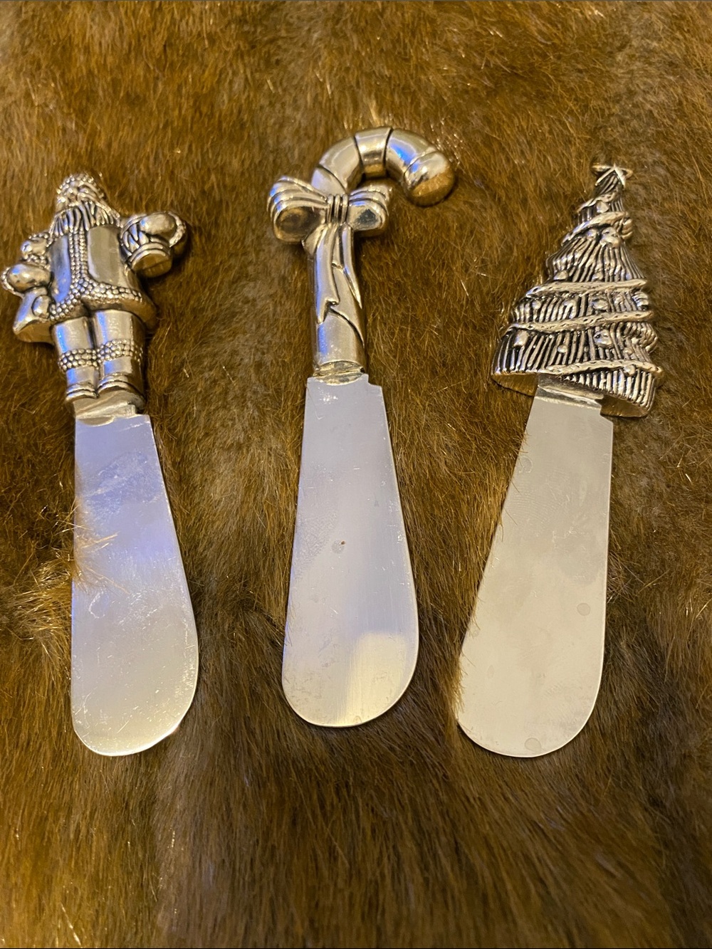 Wallace Christmas butter and cheese spreader, has weight